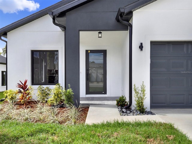 property entrance featuring a garage