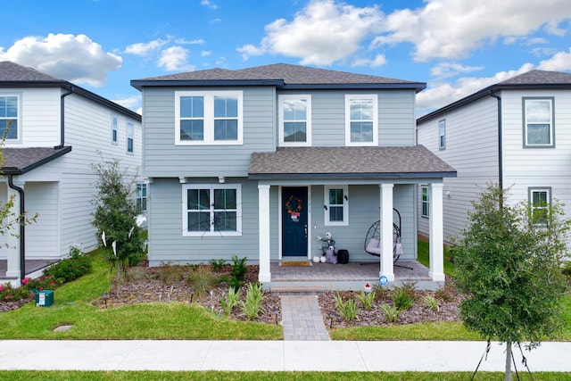 front of property with a porch