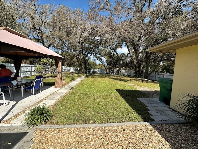 view of yard featuring a patio and a gazebo