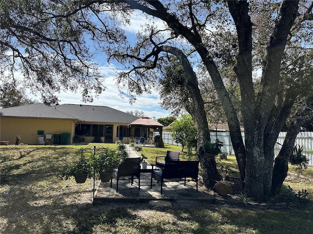 view of yard with a gazebo and a patio