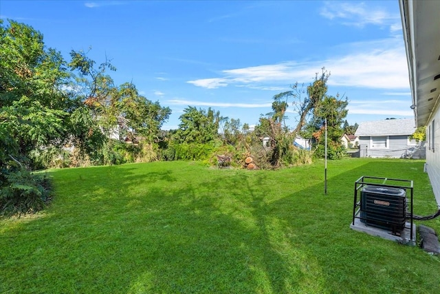 view of yard featuring central AC unit