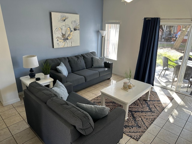 living room with light tile patterned floors