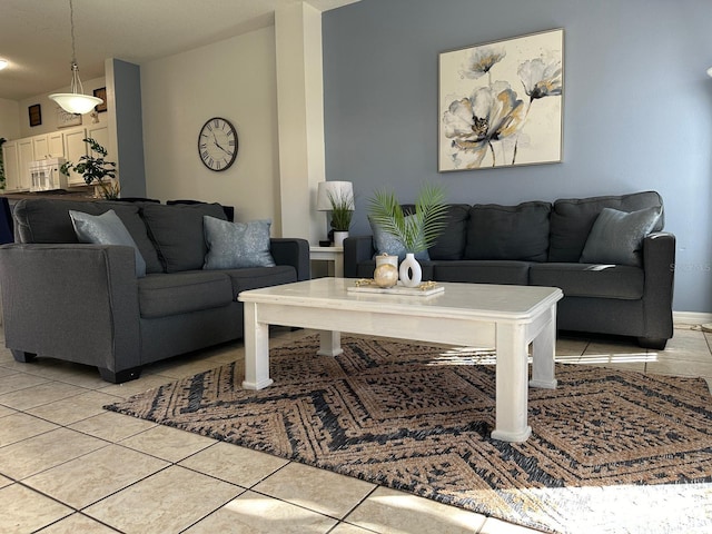 living room with light tile patterned floors