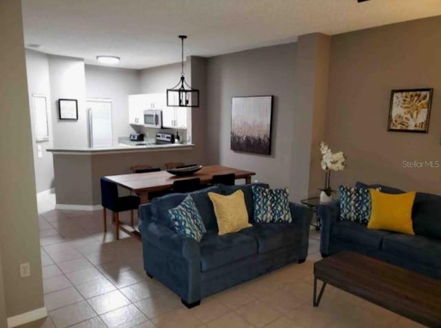 living room featuring a chandelier