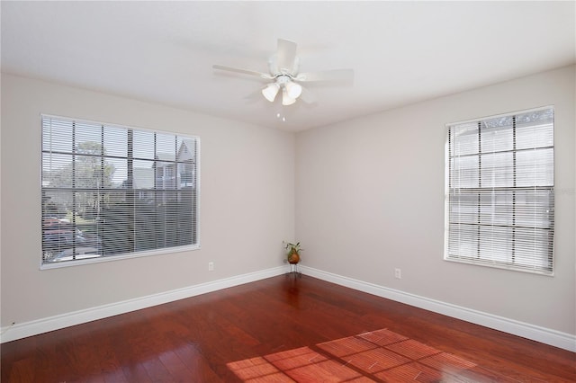 spare room featuring ceiling fan and wood-type flooring