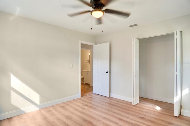 unfurnished bedroom featuring light hardwood / wood-style floors and ceiling fan