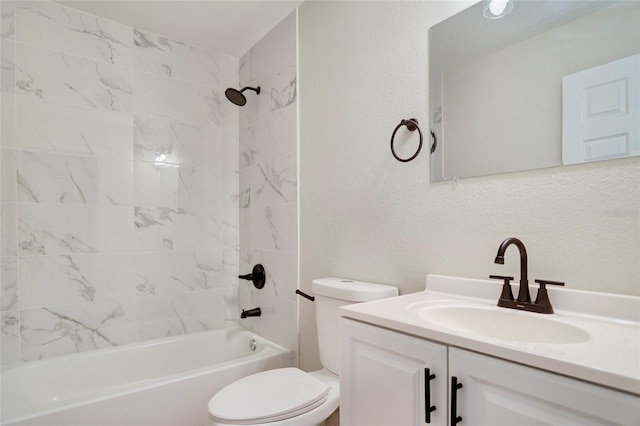 full bathroom featuring vanity, toilet, and tiled shower / bath combo