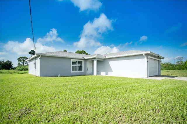 ranch-style house with a front lawn and a garage