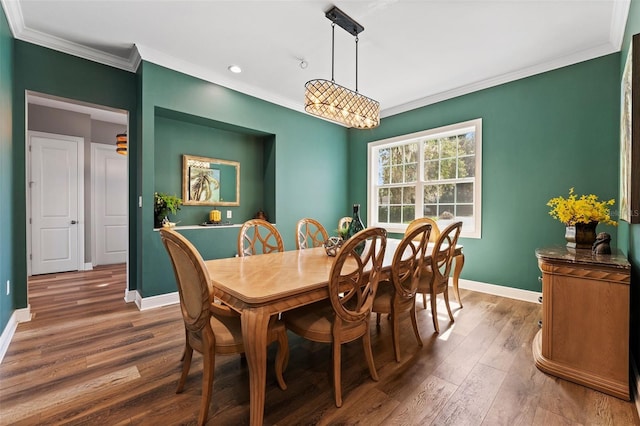 6019 Linneal Beach Dr, Apopka, FL 32703 - dining room featuring baseboards, ornamental molding, wood finished floors, and recessed lighting