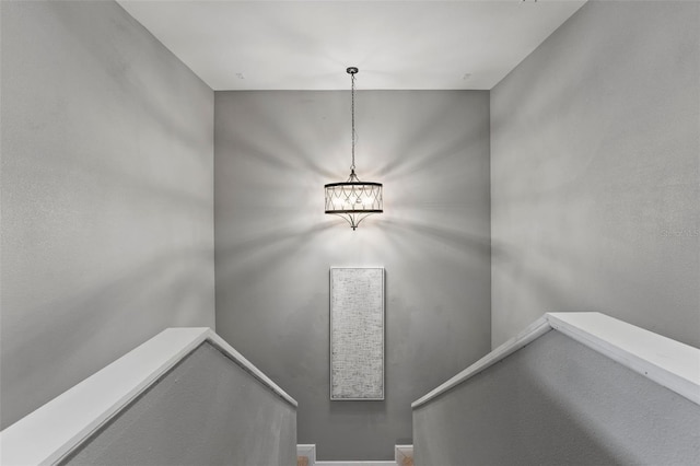 6019 Linneal Beach Dr, Apopka, FL 32703 - stairway featuring a chandelier