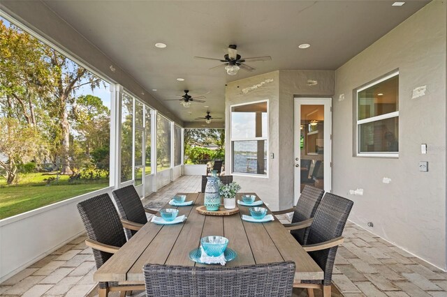 6019 Linneal Beach Dr, Apopka, FL 32703 - sunroom with a ceiling fan and outdoor dining area