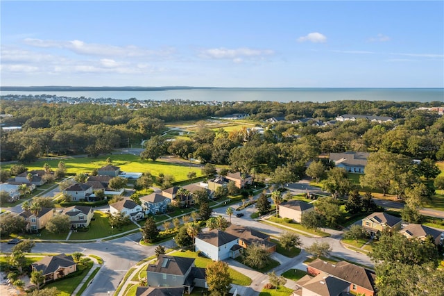 aerial view with a residential view and a water view