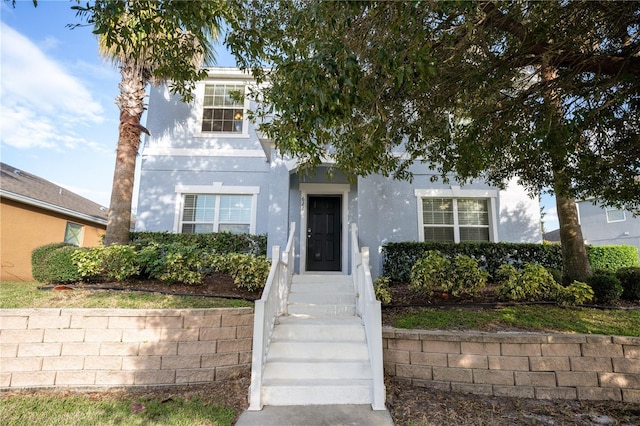 view of front of home with stucco siding