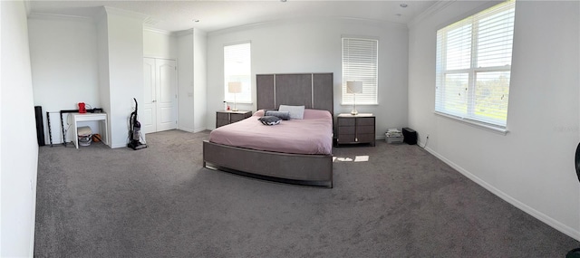 carpeted bedroom with crown molding