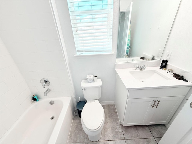 full bathroom with vanity, tiled shower / bath combo, toilet, and tile patterned floors