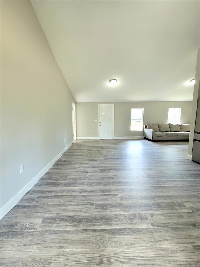 unfurnished living room featuring light hardwood / wood-style flooring