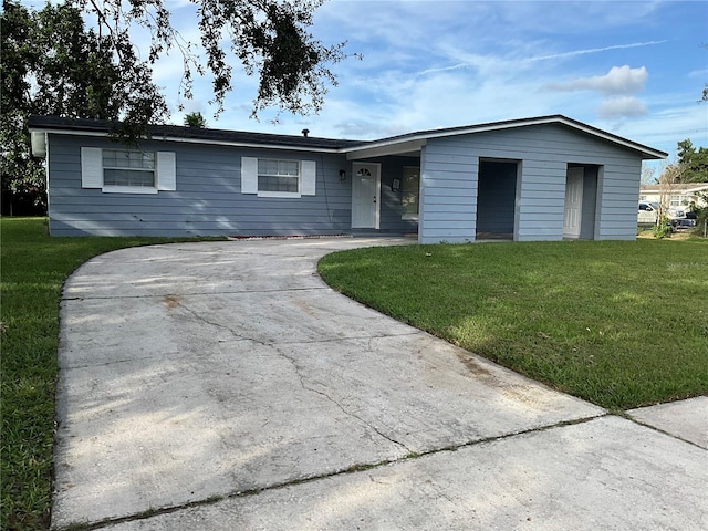 ranch-style home with a front yard