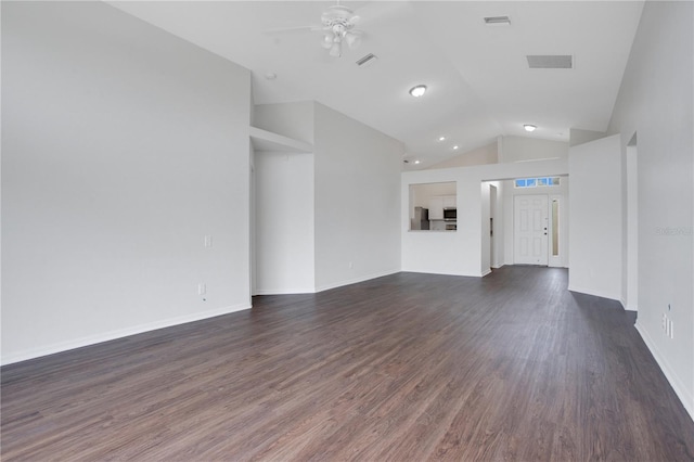 unfurnished living room featuring lofted ceiling, ceiling fan, and dark hardwood / wood-style floors