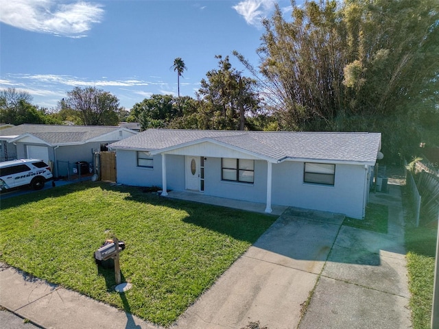 single story home featuring a porch and a front yard