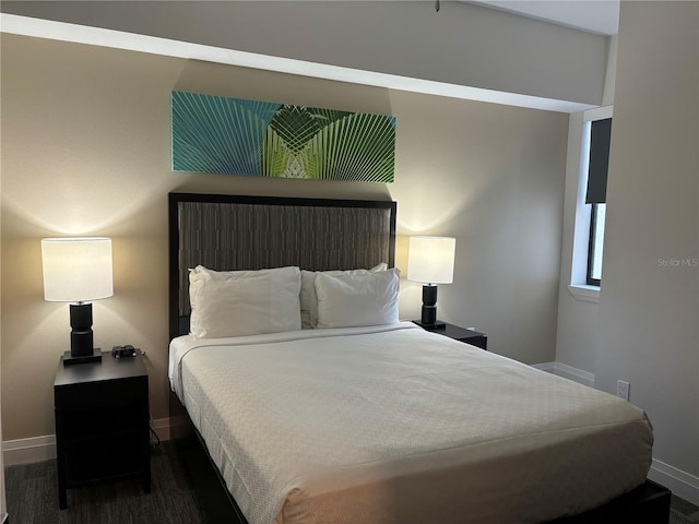 14501 Grove Resort Ave Unit 2608, Winter Garden, FL 34787 - bedroom featuring baseboards and dark wood finished floors
