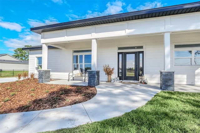 entrance to property with covered porch