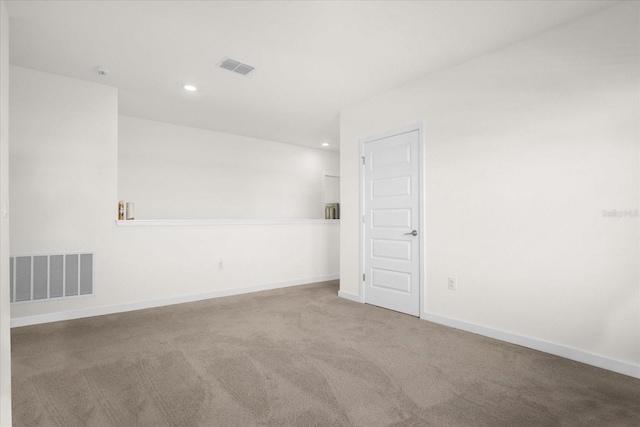 empty room with carpet flooring