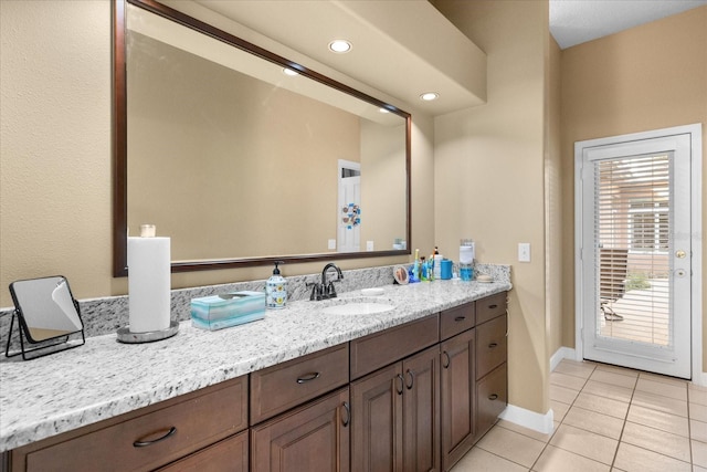 bathroom with vanity and tile patterned floors