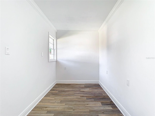 unfurnished room featuring crown molding and dark hardwood / wood-style flooring