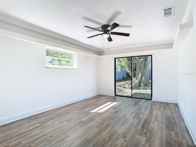 unfurnished room featuring hardwood / wood-style floors and ceiling fan