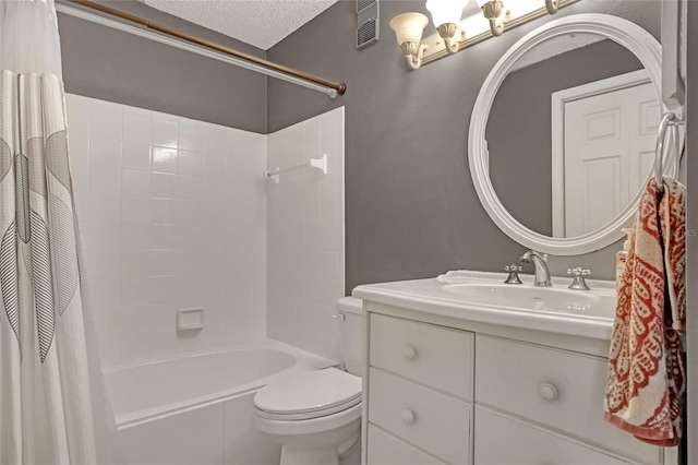 full bathroom with vanity, toilet, a textured ceiling, and shower / bath combo with shower curtain