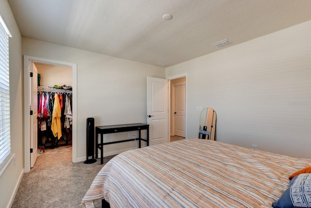 4009 Winding Meadows St, Apopka, FL 32712 - bedroom with visible vents, carpet flooring, multiple windows, and a spacious closet