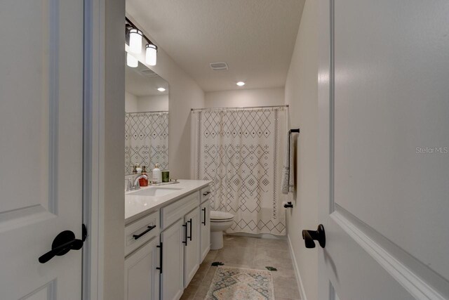 4009 Winding Meadows St, Apopka, FL 32712 - bathroom featuring visible vents, a shower with shower curtain, toilet, vanity, and tile patterned flooring