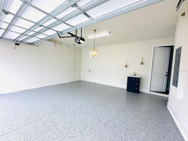 garage featuring electric panel, baseboards, and a garage door opener