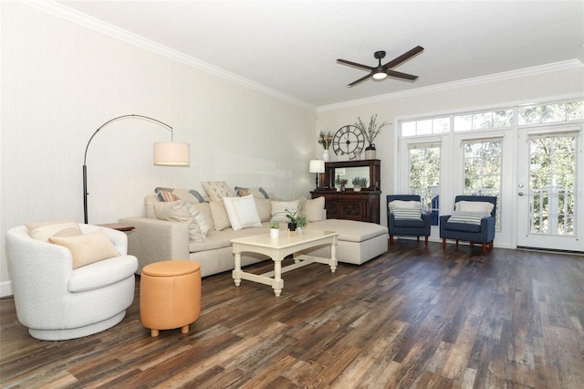 living room with crown molding, ceiling fan, and dark hardwood / wood-style flooring