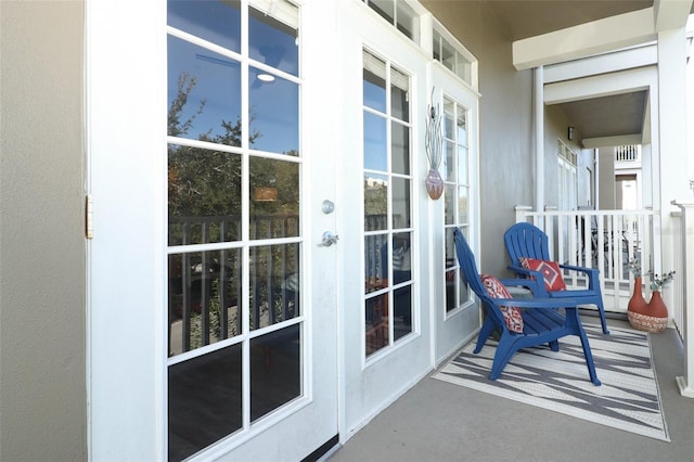 balcony featuring french doors