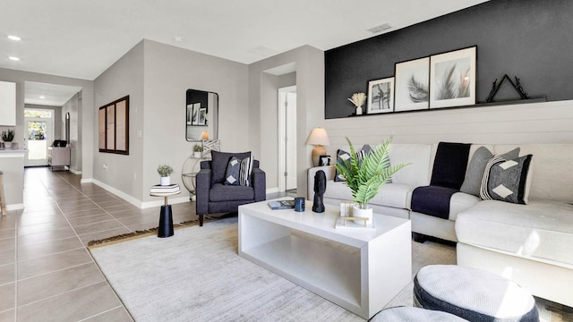 living room with light tile patterned floors