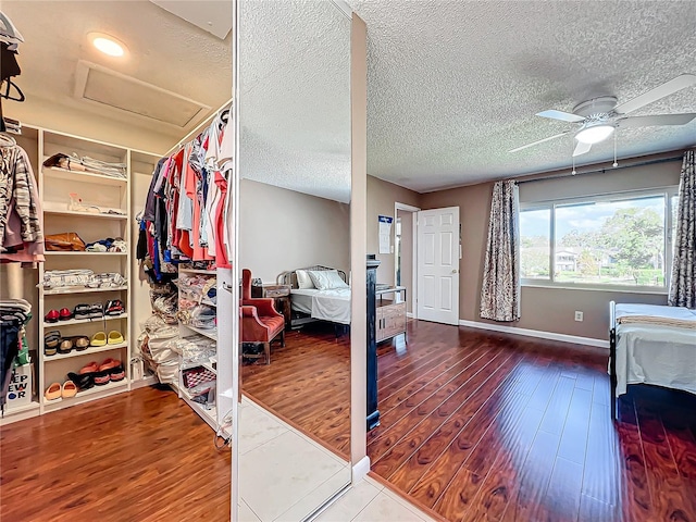 interior space with ceiling fan and hardwood / wood-style floors