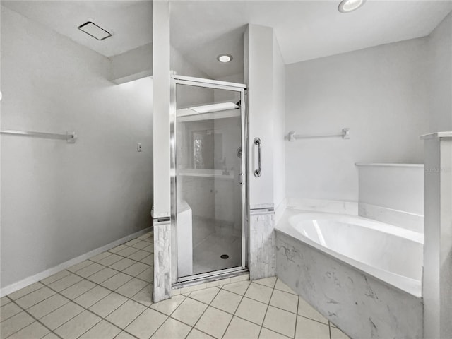 bathroom with plus walk in shower and tile patterned flooring