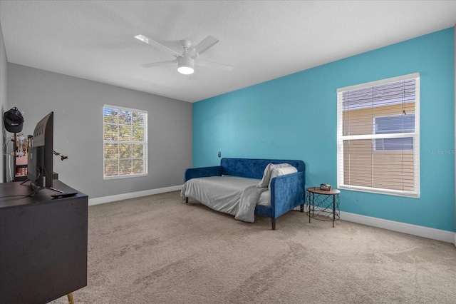 bedroom with carpet flooring and ceiling fan