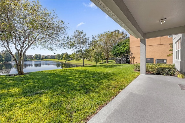 view of yard with a water view