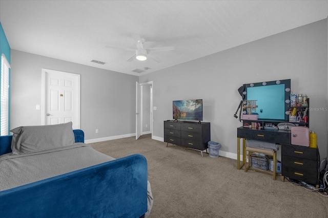 bedroom with baseboards, visible vents, ceiling fan, and carpet flooring