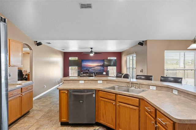 kitchen featuring sink, ceiling fan, dishwasher, and plenty of natural light