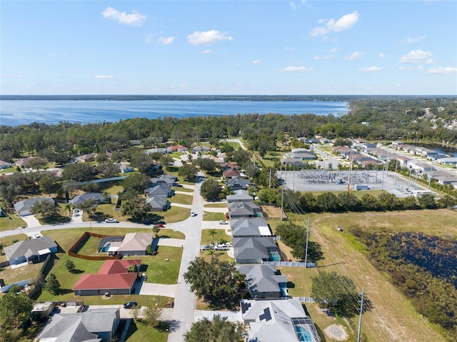 drone / aerial view with a water view