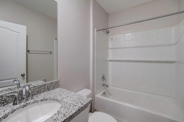 full bathroom with toilet, vanity, and bathing tub / shower combination