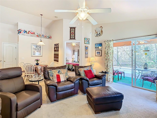 living room with high vaulted ceiling, carpet, and ceiling fan