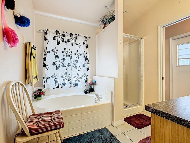 bathroom with vanity, separate shower and tub, and tile patterned flooring