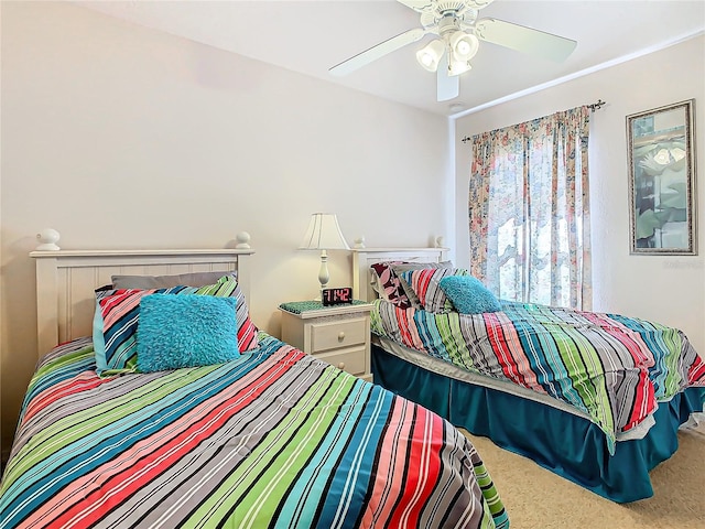 bedroom with carpet and ceiling fan