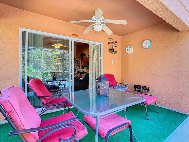 view of patio featuring ceiling fan