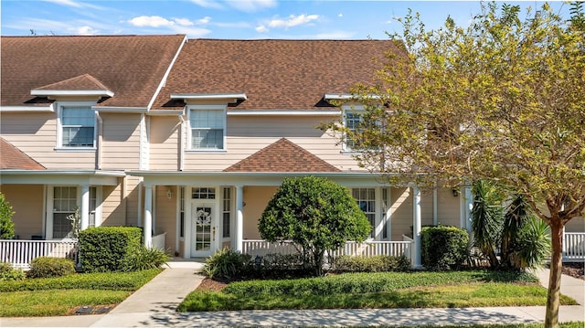 view of property with a porch