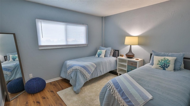 145 N Halifax Ave Unit 711, Daytona Beach, FL 32118 - bedroom featuring hardwood / wood-style floors